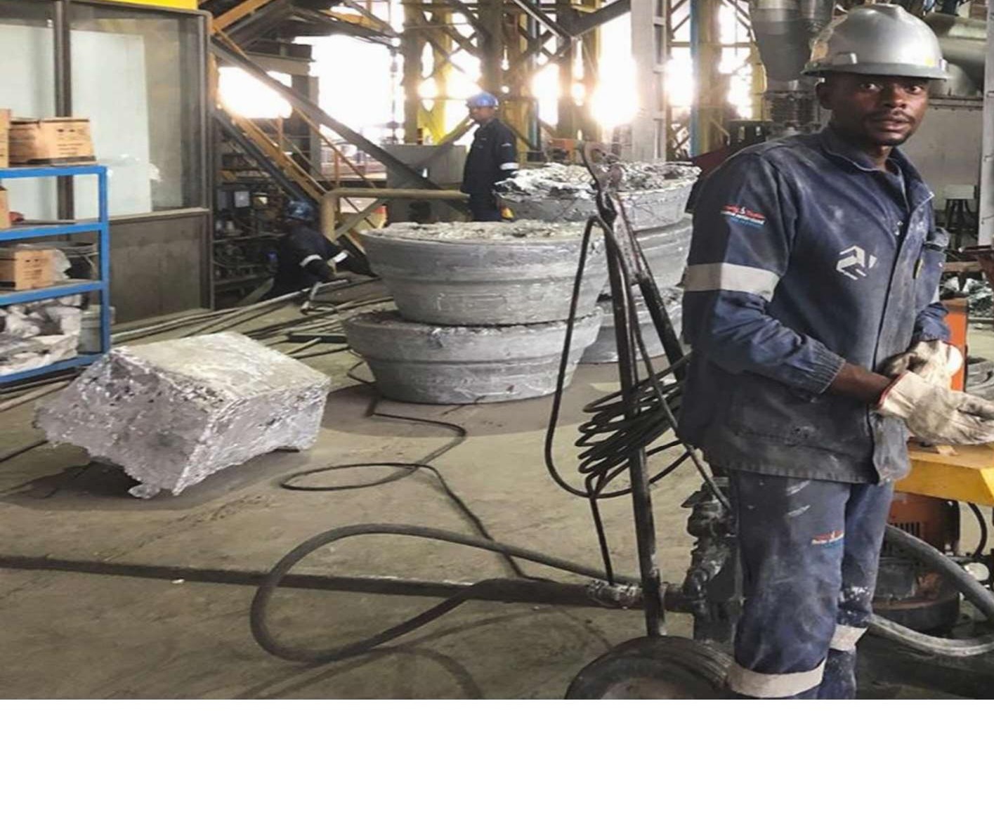 PFB refractory crew gunning a lining on site